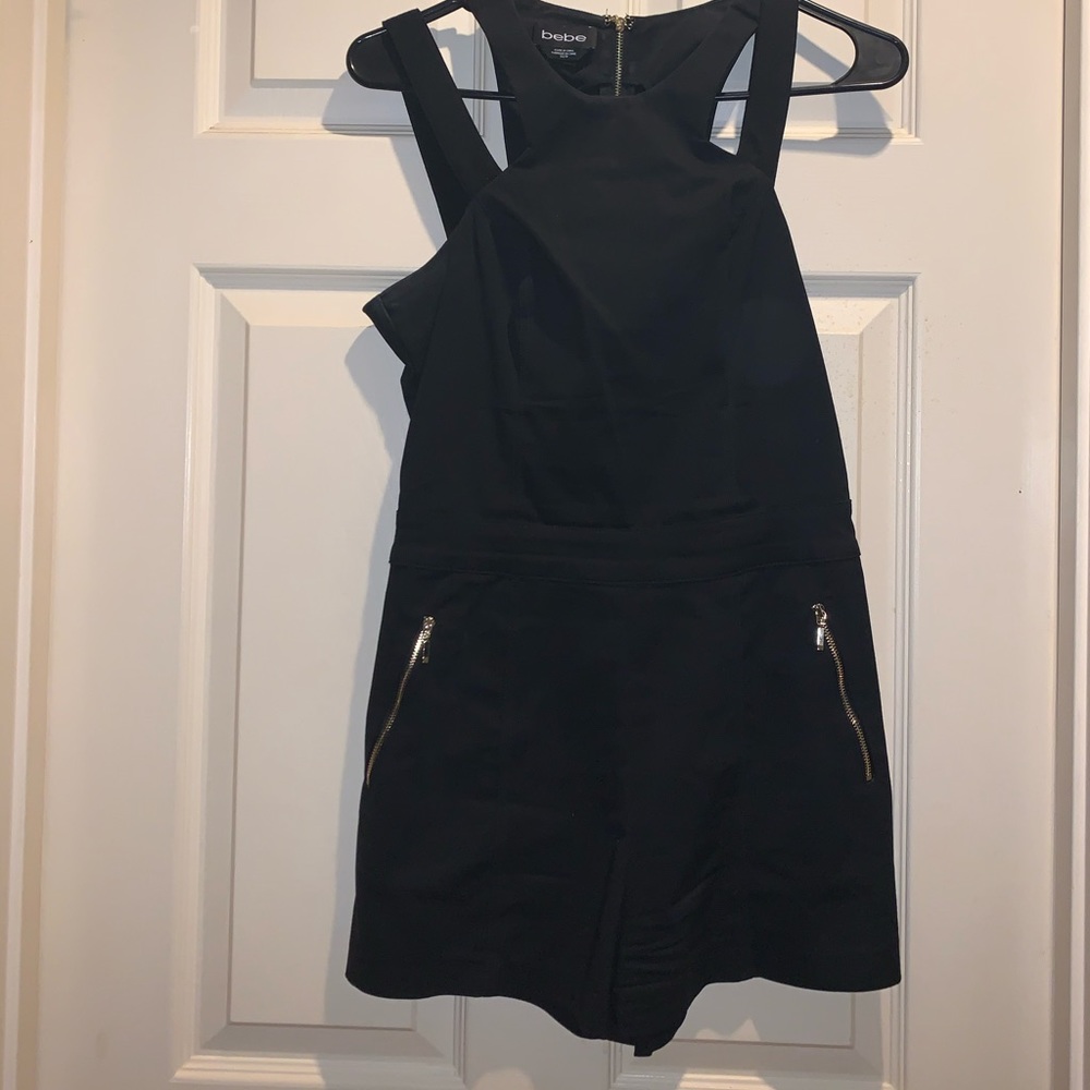 Black shoulder cut out bebe romper